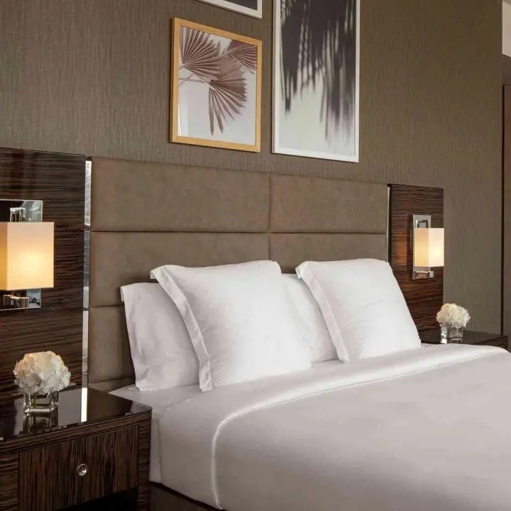 empty bed with white bedding