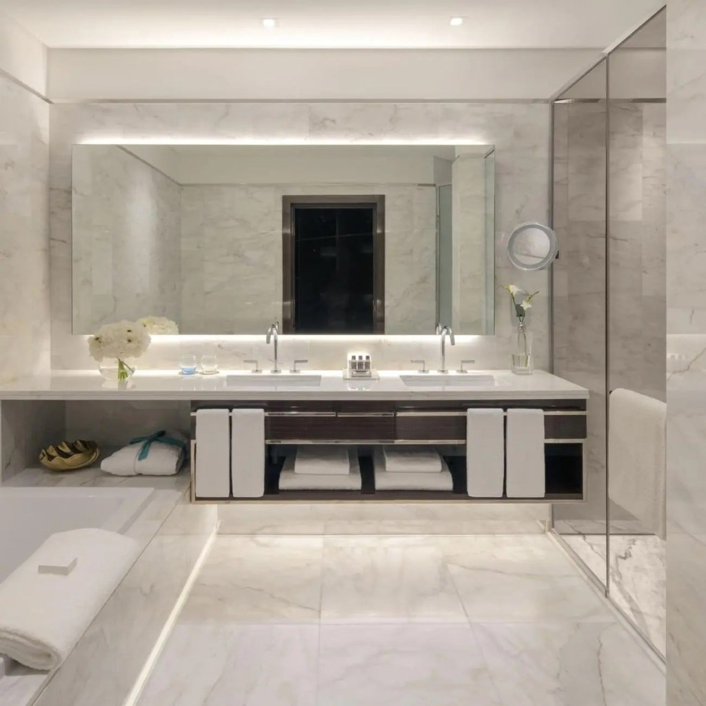 hotel bathroom with double sink unit